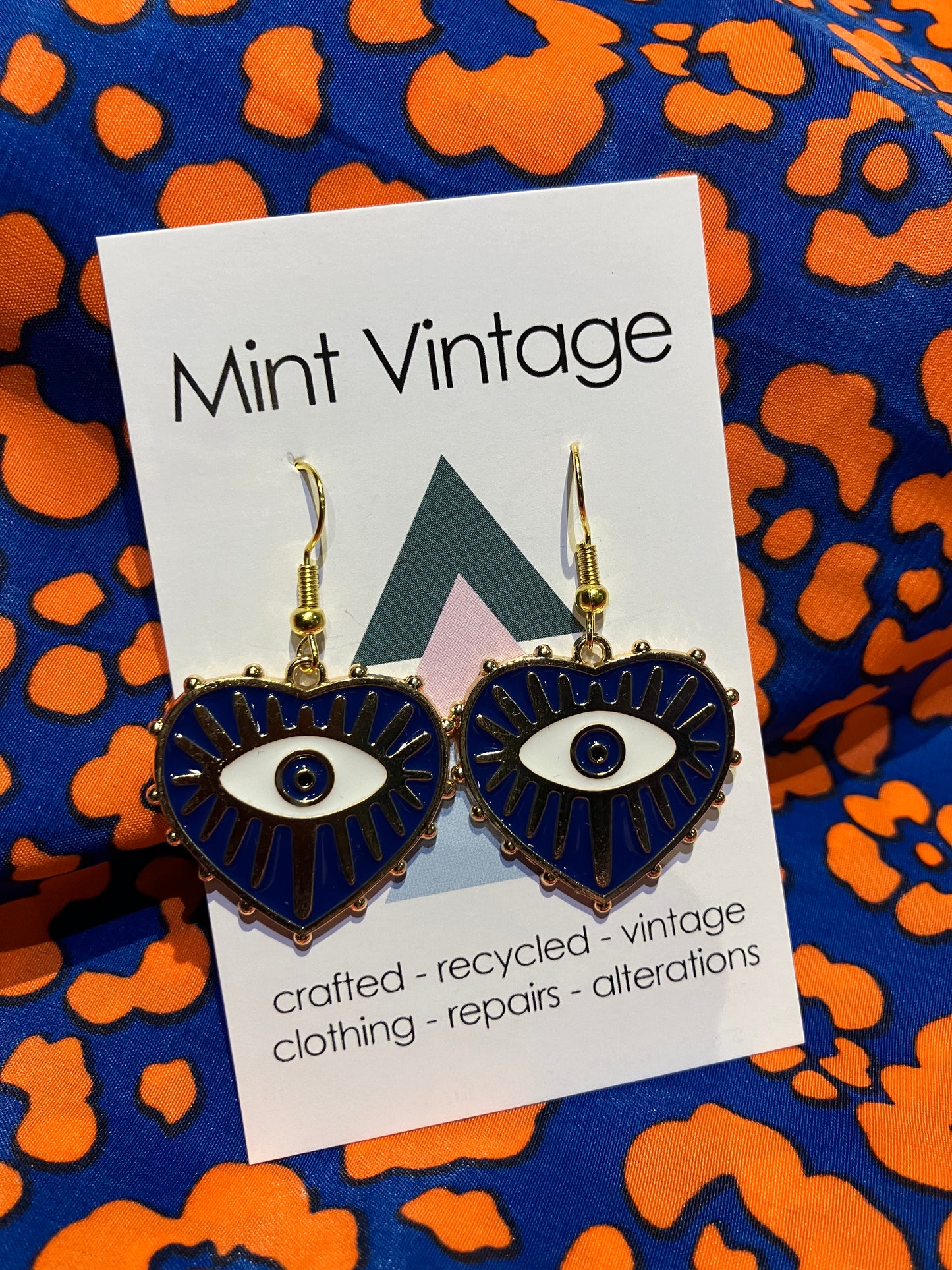 Evil eye enamel heart black and gold earrings
