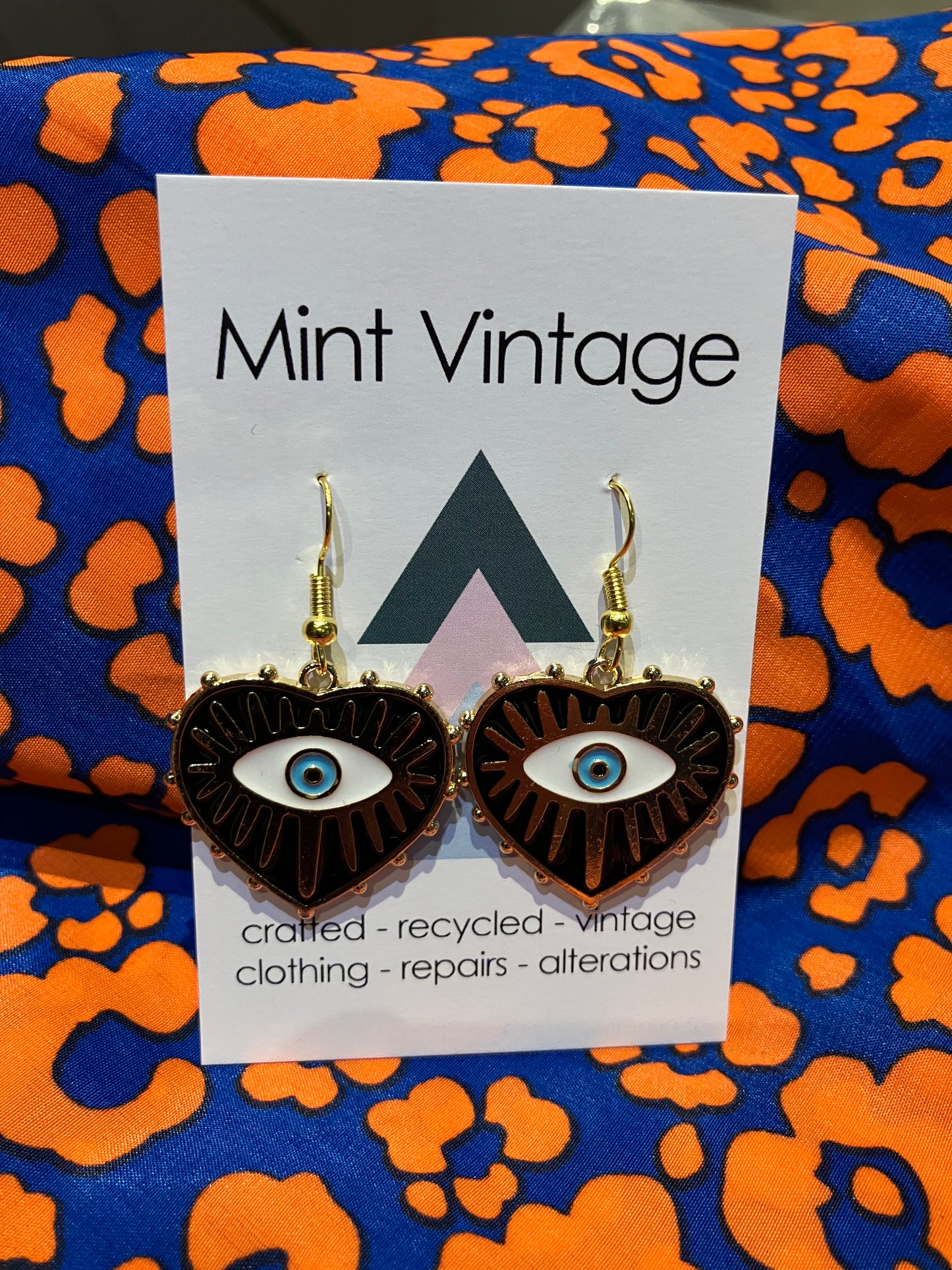 Evil eye enamel heart black and gold earrings