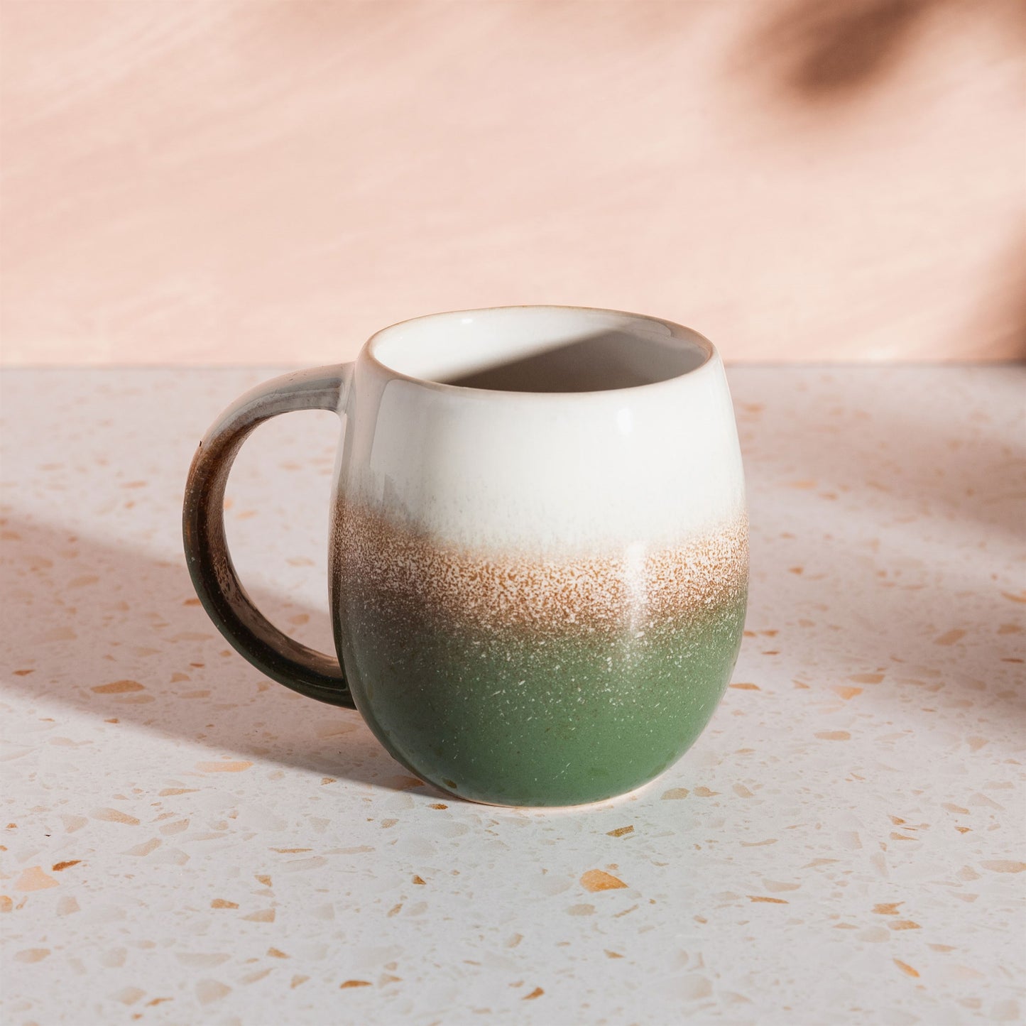 Green glazed mug