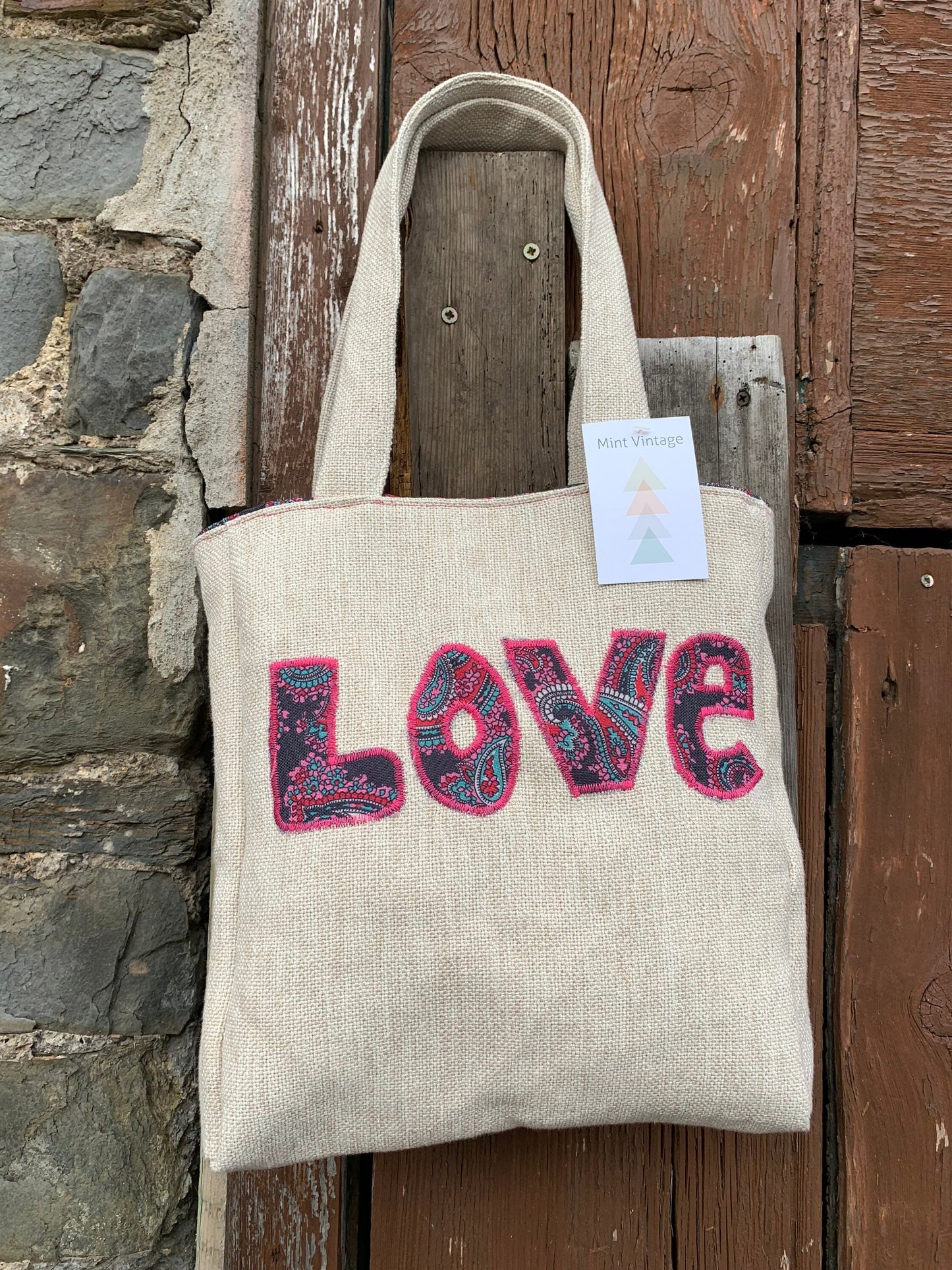 Handmade appliqué LOVE tote bag made from repurposed vintage textiles