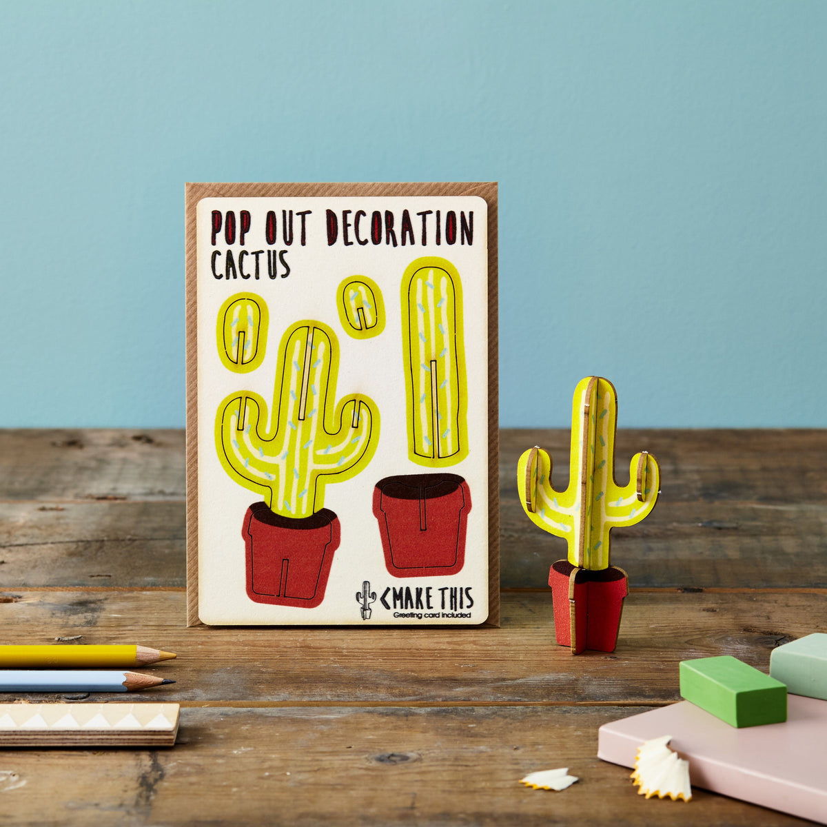 Pop out greeting card featuring green cactus