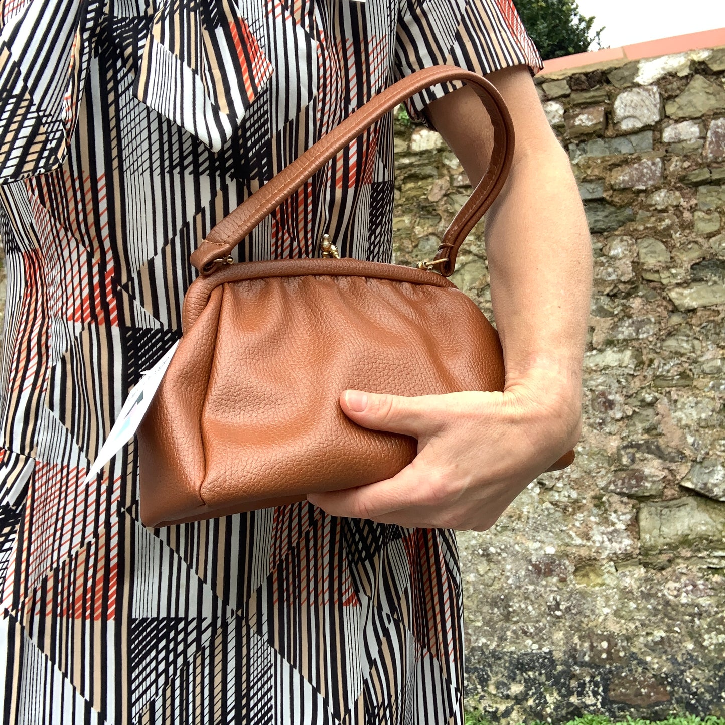 Vintage 1960’s brown vinyl Kelly style handbag