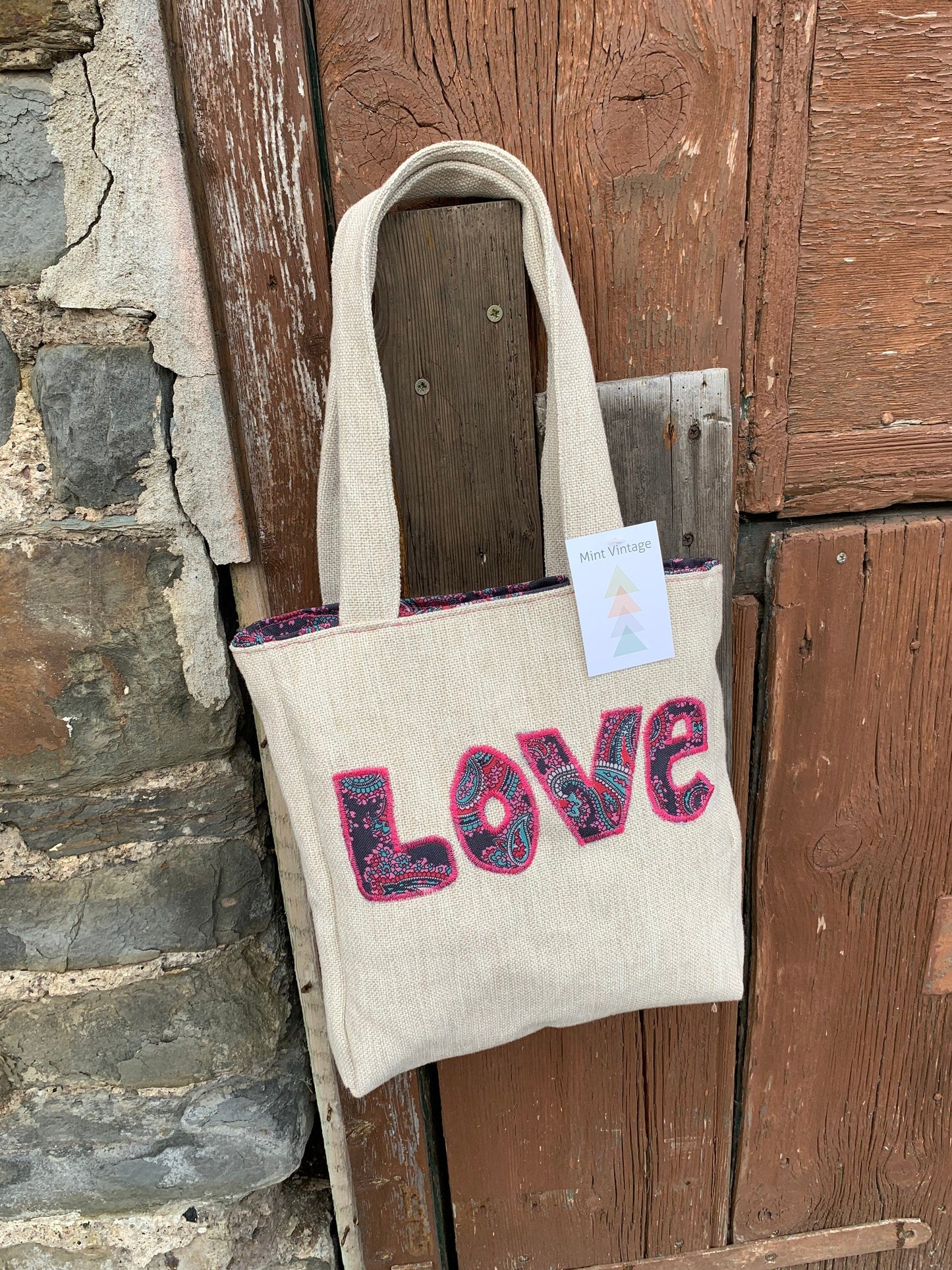 Handmade appliqué LOVE tote bag made from repurposed vintage textiles